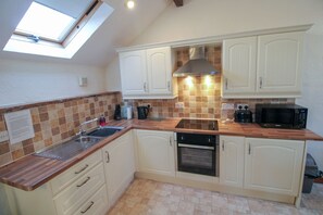 Fridge, microwave, oven, cookware/dishes/utensils