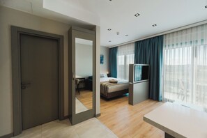 Deluxe-Zimmer, Balkon, Gartenblick | Zimmersafe, schallisolierte Zimmer, kostenloses WLAN