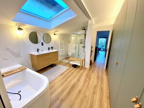 Shower, hair dryer, towels, soap