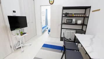 Departamento (302) | Área de sala de estar | Smart TV de 20 cm con canales por cable