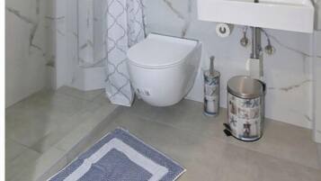 Hair dryer, towels, soap, toilet paper
