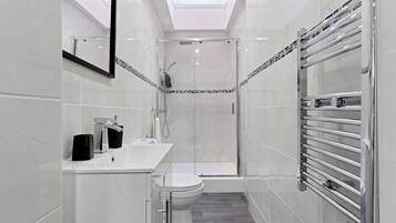 Shower, bidet, towels, soap