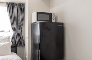 コンフォート アパートメント | リビング エリア | 20 cmのテレビ (ケーブル放送視聴可)