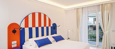Junior Suite, Balcony, City View | 1 bedroom, in-room safe, soundproofing, iron/ironing board