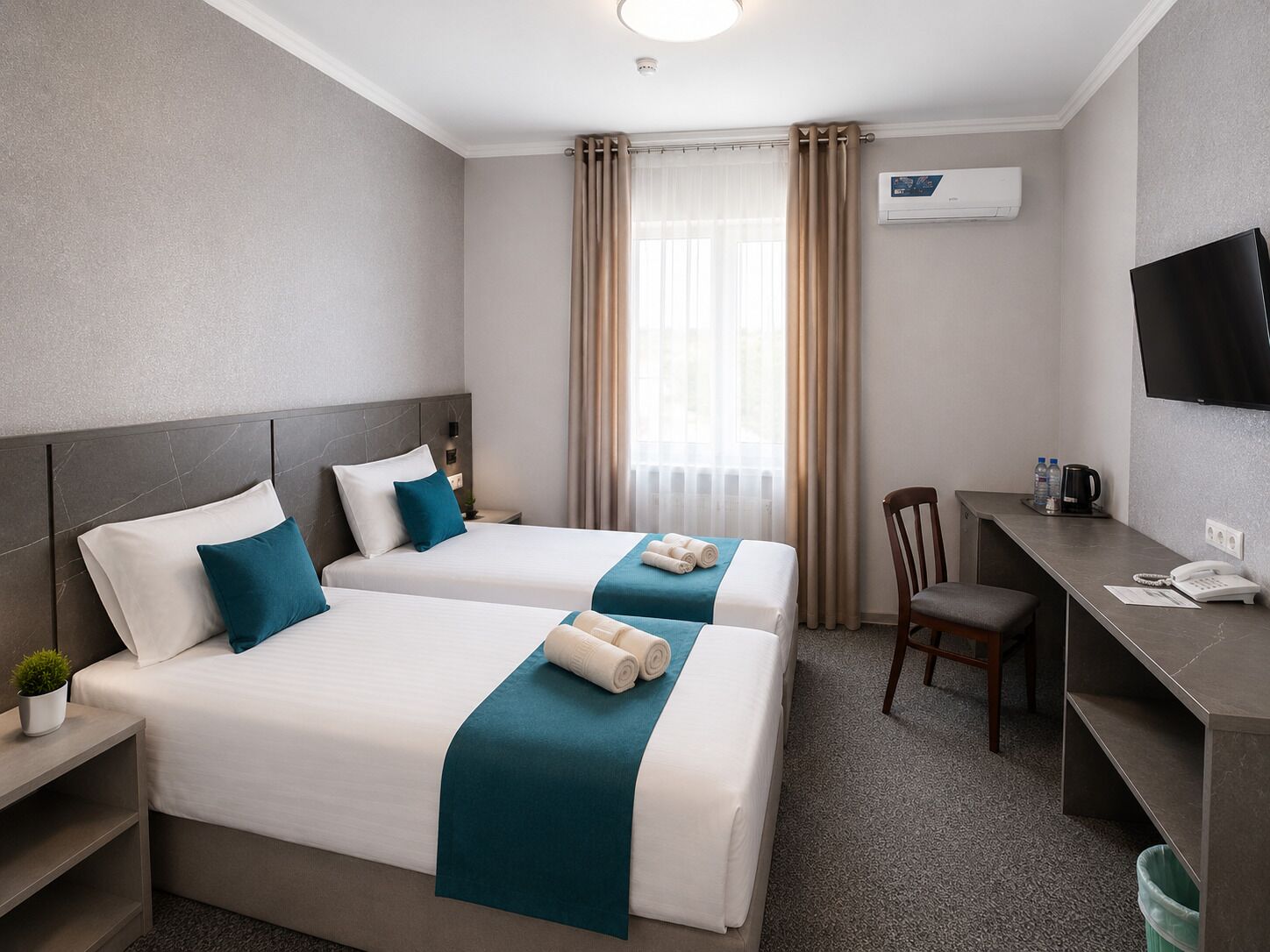 Standard Twin Room | Desk, laptop workspace, blackout drapes, iron/ironing board