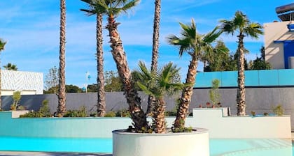 Appartement élégant avec piscine et emplacement distinctif .