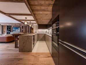 Enjoy cooking in this kitchen with a central island and sleek cabinetry.