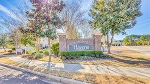 A sign for "The Havens" residential community with a brick wall and landscaped area. - Beach Shuttle & Pool: North Myrtle Beach Condo! (North Myrtle Beach)