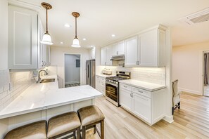 Interior - Patio & Workspace: Peaceful Riverside Apartment! (Riverside)