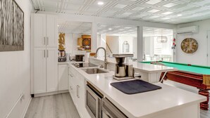A modern kitchen with white cabinetry, a coffee maker, and a pool table. - Game Room! Boater's Base on Lookout Shoals Lake (Stony Point)