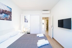 Luxury Apartment, Balcony, Garden View | 3 bedrooms, in-room safe, desk, laptop workspace