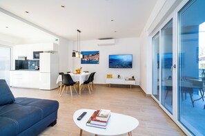 Appartement Luxe, balcon, vue jardin | Coin séjour