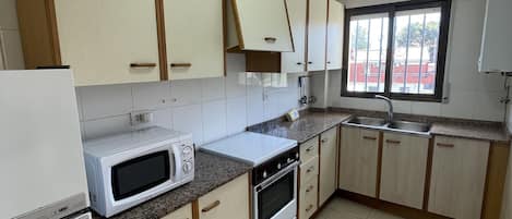 Fridge, microwave, oven