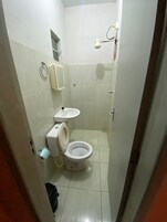 Ducha, toallas, jabón y champú