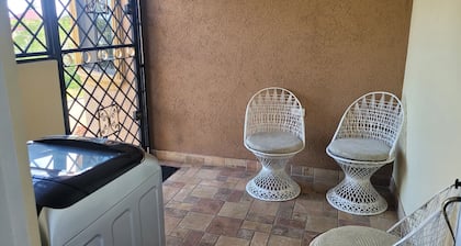 Spacious 2-bedroom apartment in Mandeville with hot tub ,WiFi and private garage