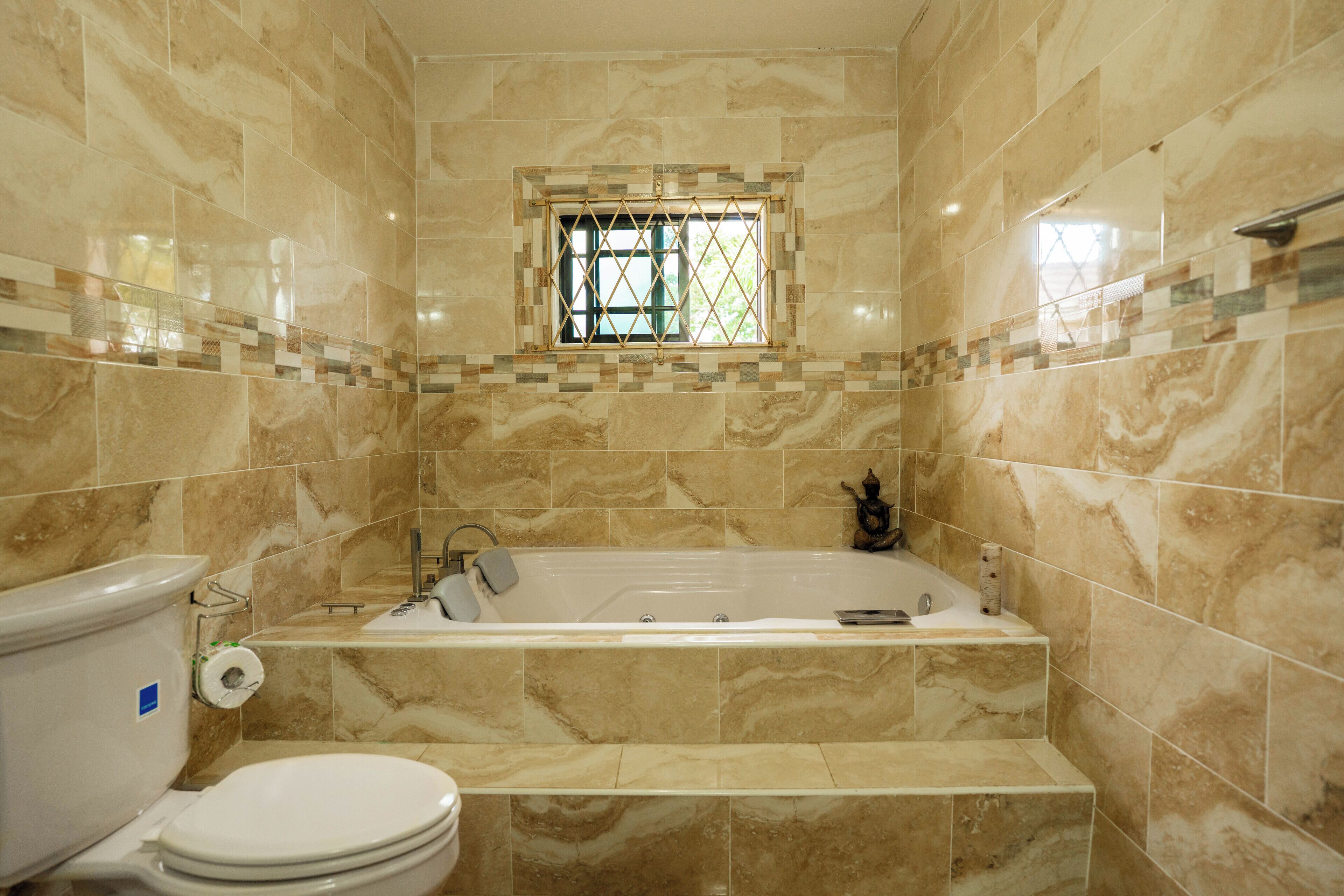 Shower, jetted bath, free toiletries, hair dryer