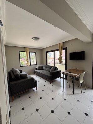 Family Apartment, 1 Bedroom, Balcony, City View | 1 bedroom, desk, laptop workspace, soundproofing - metropolitan apart (Marmaris)
