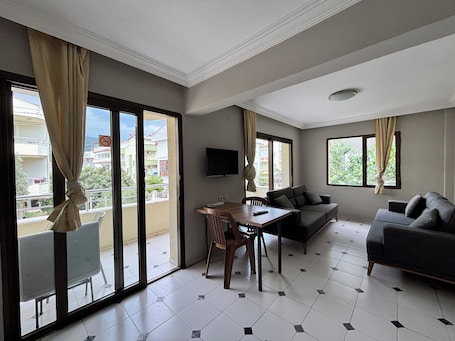 Family Apartment, 1 Bedroom, Balcony, City View | 1 bedroom, desk, laptop workspace, free WiFi