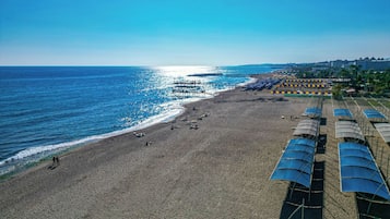 Private beach, sun loungers, beach umbrellas, beach towels