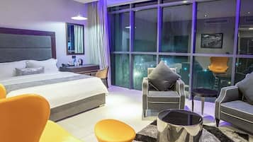 Economy Room, Balcony, City View | Desk, laptop workspace, blackout drapes, soundproofing