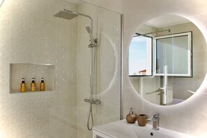 Hair dryer, towels, soap, toilet paper
