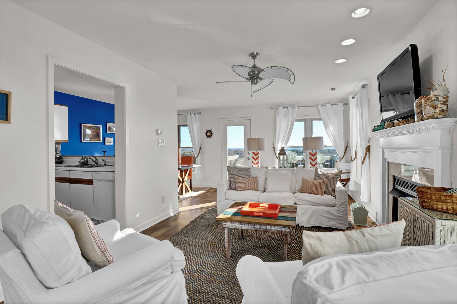 TV, fireplace, books