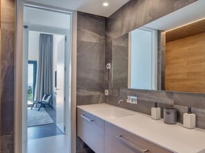 Hair dryer, towels, soap, shampoo