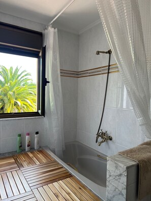 Hair dryer, bidet, towels, soap