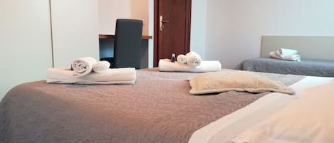 3 bedrooms, desk, iron/ironing board, travel cot