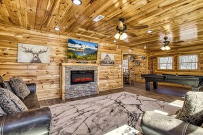Smart TV, chimenea, videojuegos, futbolito