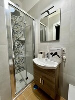 Family Apartment, 1 Double Bed with Sofa bed, Refrigerator & Microwave, Mountain View | Bathroom | Hair dryer, soap, shampoo, toilet paper