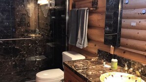 A bathroom with a marble sink, a toilet, and a shower. - Incredible Views - Orr Springs Rendezvous! (Ukiah)