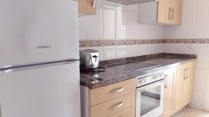 Căn hộ, ban công, quang cảnh bãi biển | Bếp riêng