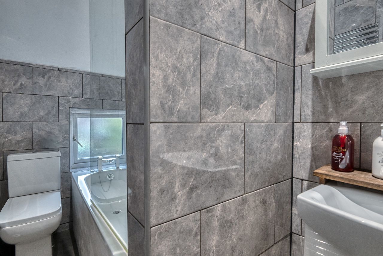 Hair dryer, bidet, towels, toilet paper