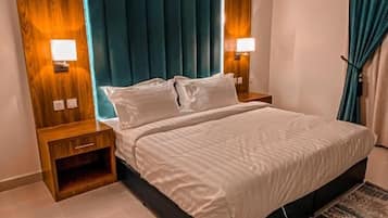 Junior Suite | Blackout drapes, iron/ironing board, free WiFi, bed sheets