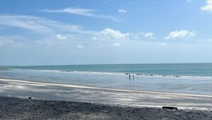 A beach with a clear sky and calm sea. - Discover Coronado's Best Area with Pool (Panamá Oeste Province)