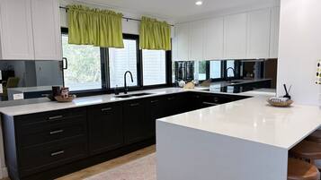 Fridge, microwave, dishwasher, coffee/tea maker