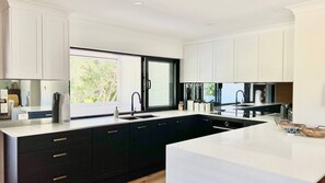 Fridge, microwave, dishwasher, coffee/tea maker