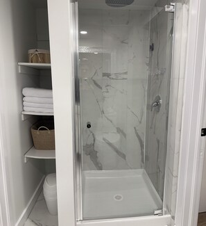 Shower, hair dryer, towels, soap
