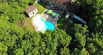 Spacious 4-bedroom house with huge pool, deck, near beaches and Cape Cod Canal
