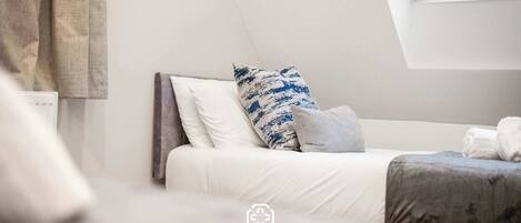 4 bedrooms, iron/ironing board, travel cot, WiFi