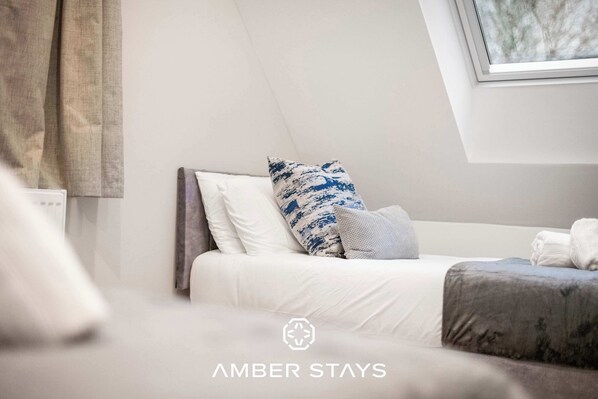 4 bedrooms, iron/ironing board, travel cot, WiFi