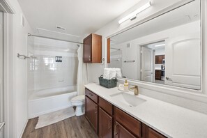Shower, towels, soap, toilet paper