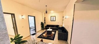 Charming 2-bedroom apartment with WiFi, AC in welcoming Luxor home stay