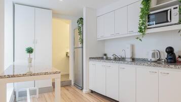 Townhome | Private kitchen | Full-size fridge