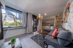 Studiolejlighed - balkon - byudsigt | Opholdsområde