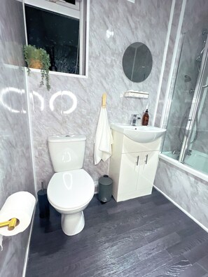 Hair dryer, towels, soap, toilet paper