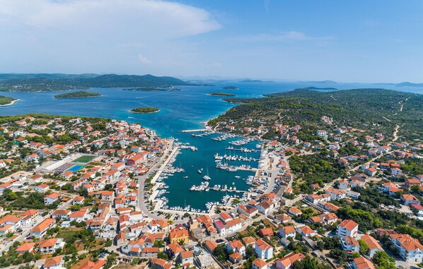 Experience the charm of a Mediterranean coastal town with a bustling marina and easy access to the sea.