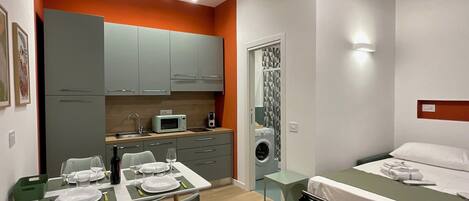 Deluxe Apartment, City View | 1 bedroom, free minibar, in-room safe, desk