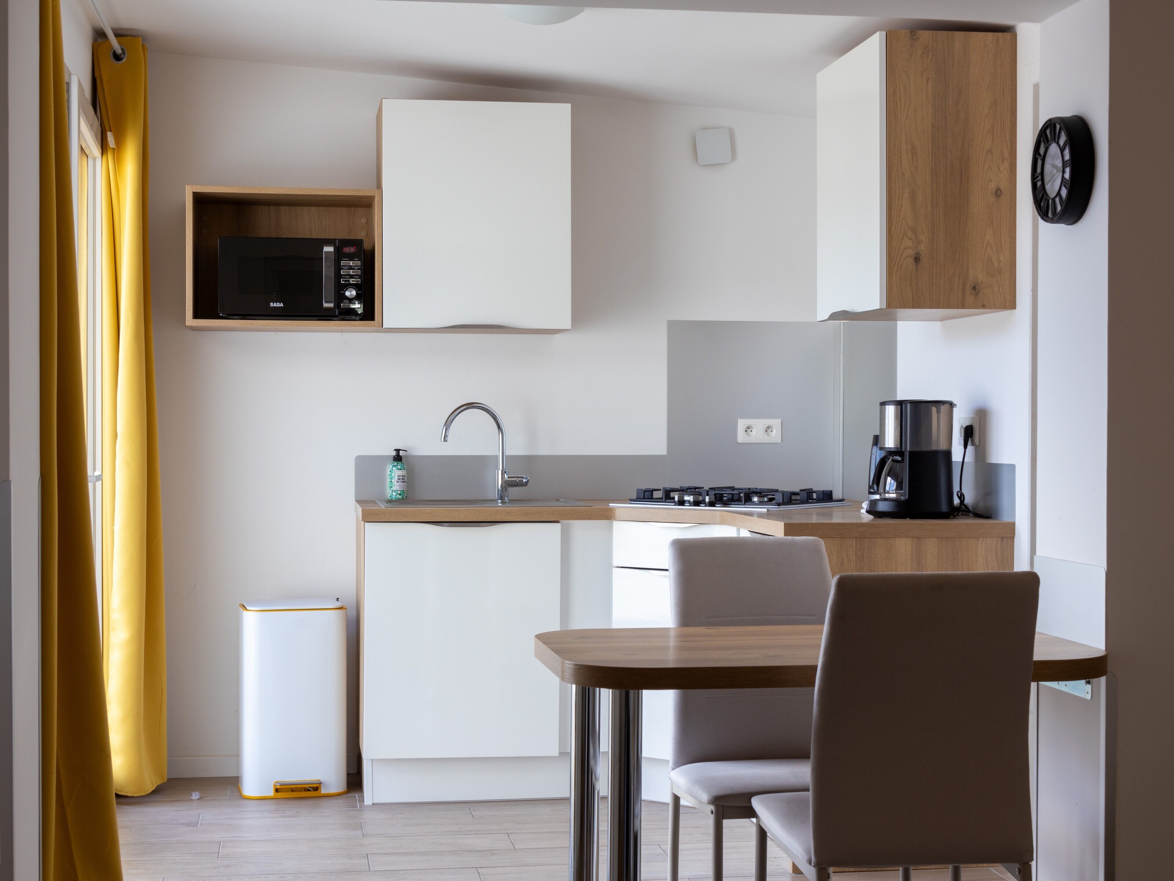 Fridge, microwave, stovetop, coffee/tea maker